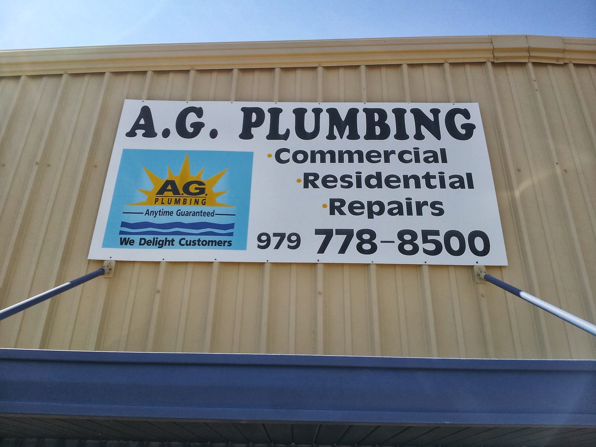 A G Plumbing signboard and branding